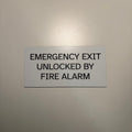 Emergency Exit Unlocked By Fire Alarm Sign 7"x3.5"